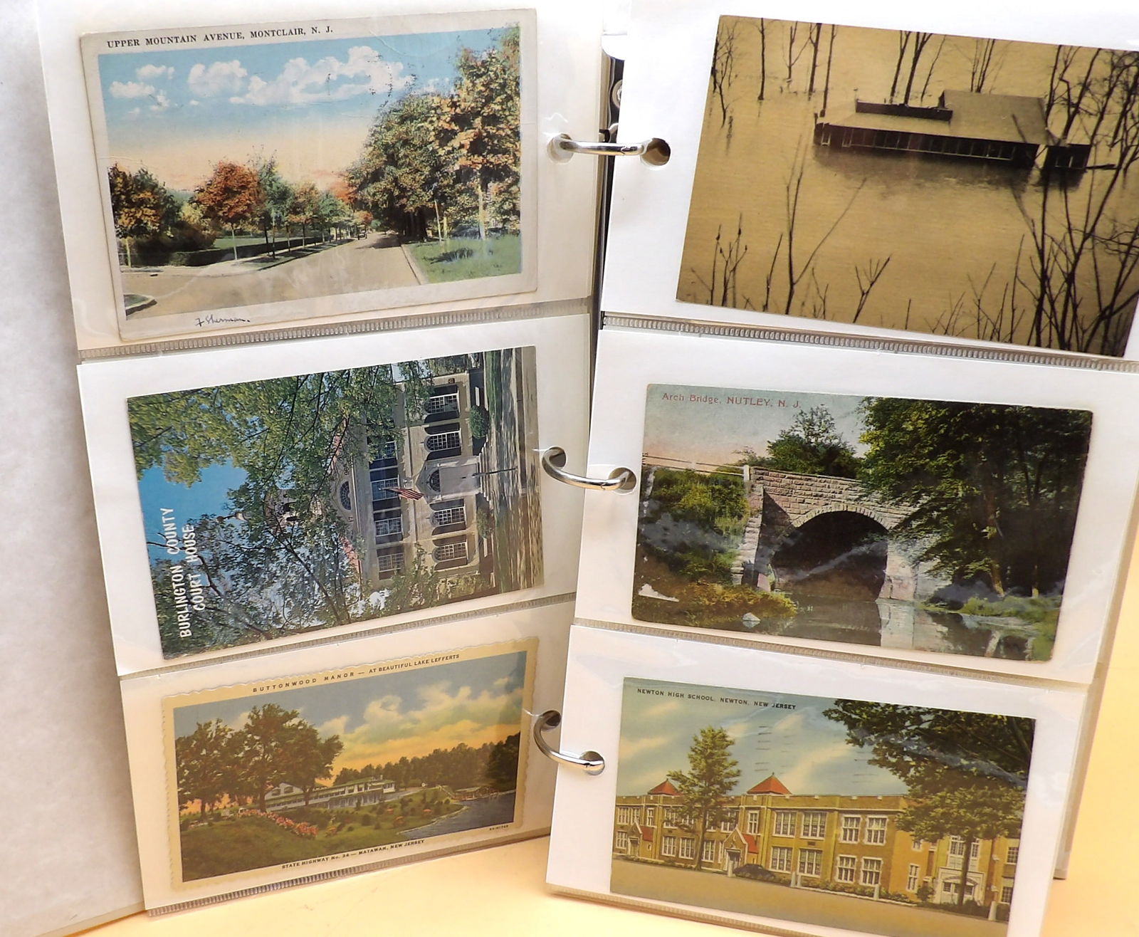 Vintage Postcard Collection of New Jersey Landmarks & Historical Buildings: This collection of postcards in a, white three-ring binder, features some of the best destinations and history New Jersey has to offer. With over 100 different unique postcards, everything from state