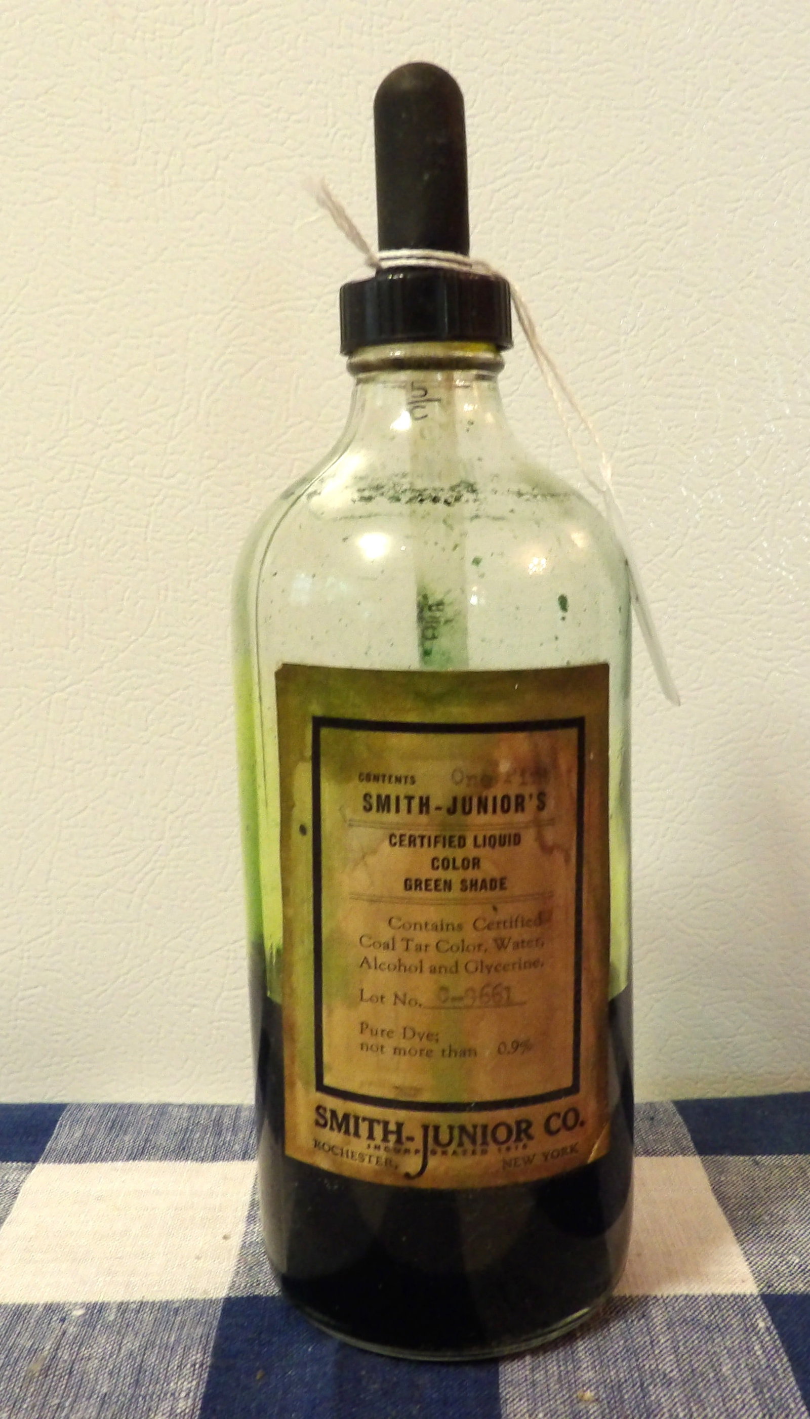 Smith-Junior Co. Certified Liquid Color Green Shade: This vintage (1920's - 1940's) glass bottle includes ink with rubber dropper. Measures 9" x 3" x 3"