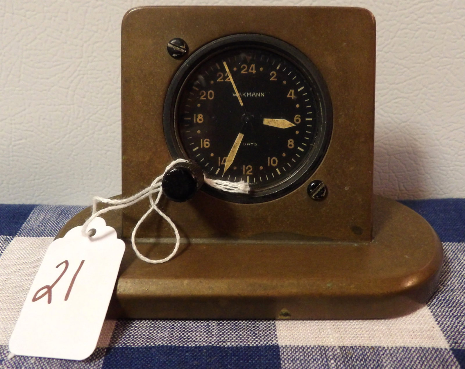 Wakmann Watch Co. Cockpit Clock: This brass encased 8 Day clock is made by Wakmann Watch Co. and measures 5.5" x 3.5" x 2.5"