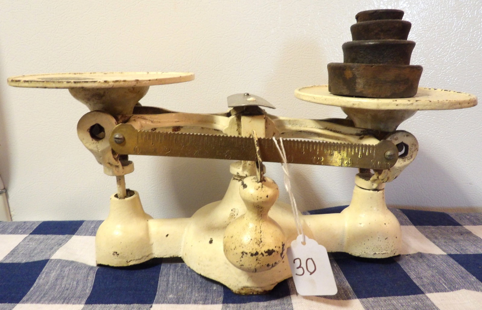 Penn Scale Mfg. Co Cast Iron Scale w/ Weights: This cast iron balance scale is made by Penn Scale Mfg Co. and includes 4 weights. Measures 14" x 5.5" x 5.5"