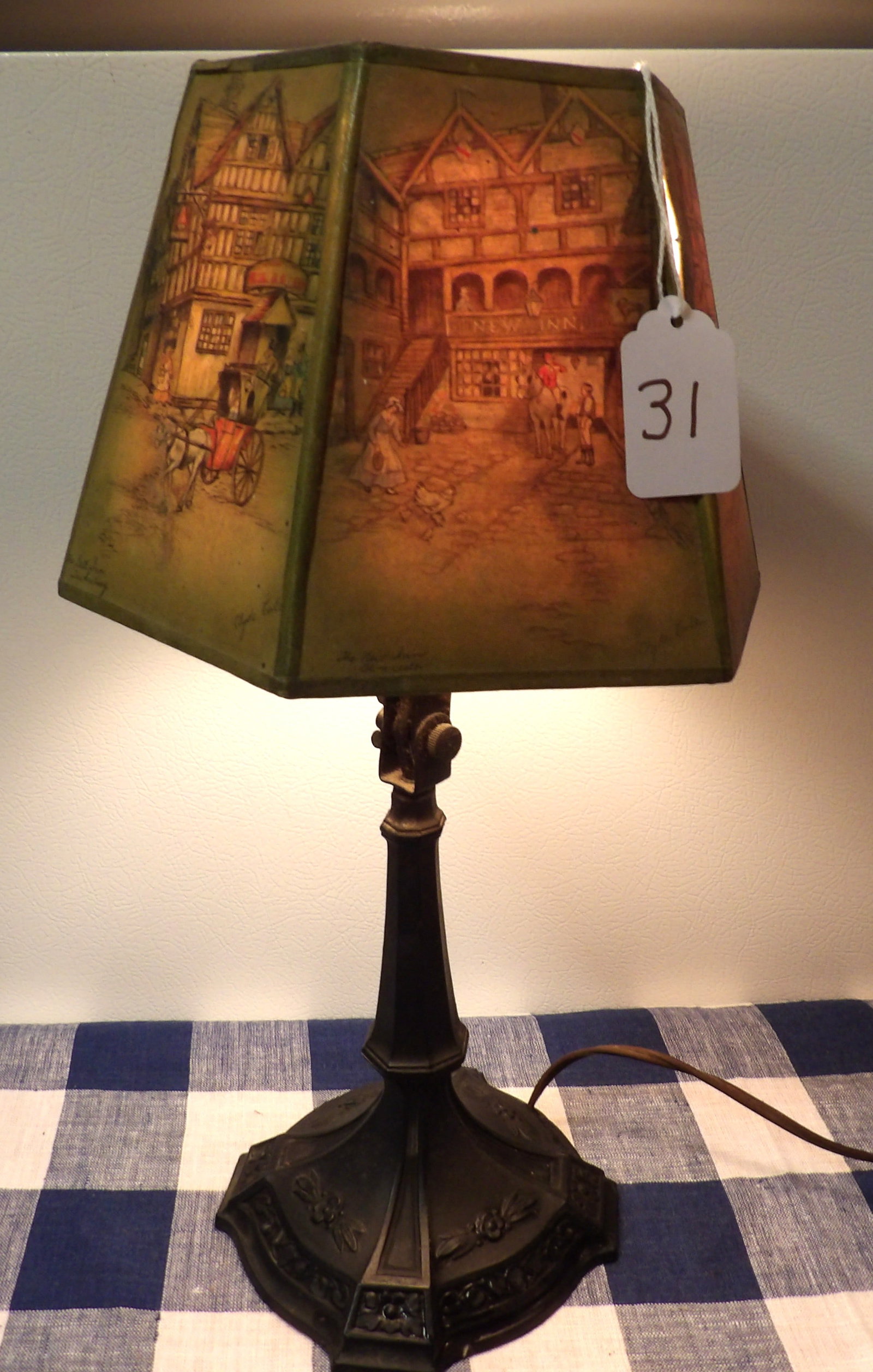 Adjustable Lamp w/ Storybook Coaching Scene: This adjustable Boudoir Lamp features a metal base and a shade showing a Storybook Coaching Scene. Measures 14.5" x 5" x 5" base x 8" shade