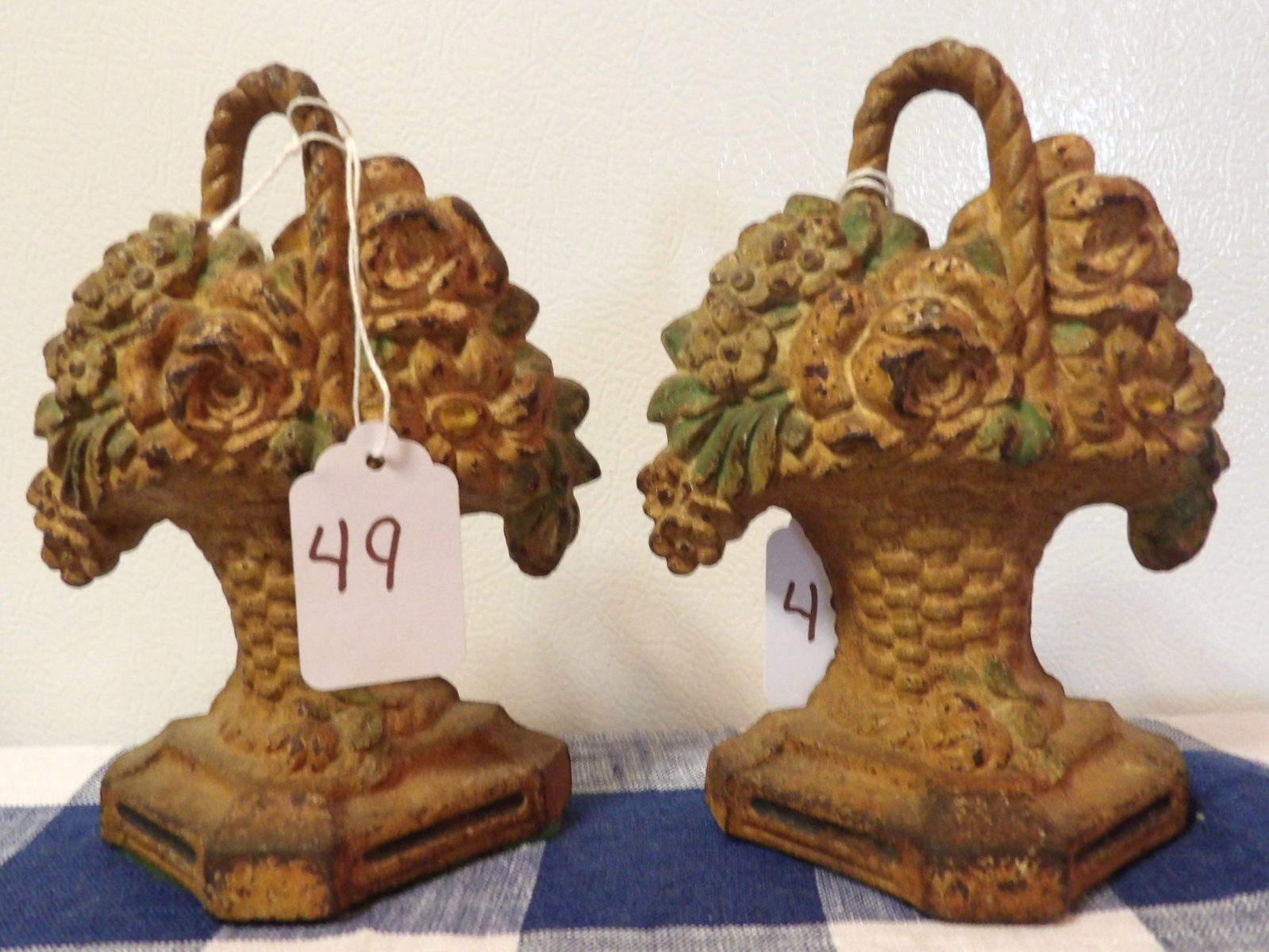 Cast Iron 'Bouquet' Bookends: This pair of cast iron bookends are in the image of a flower bouquet. Measures 6" x 5"