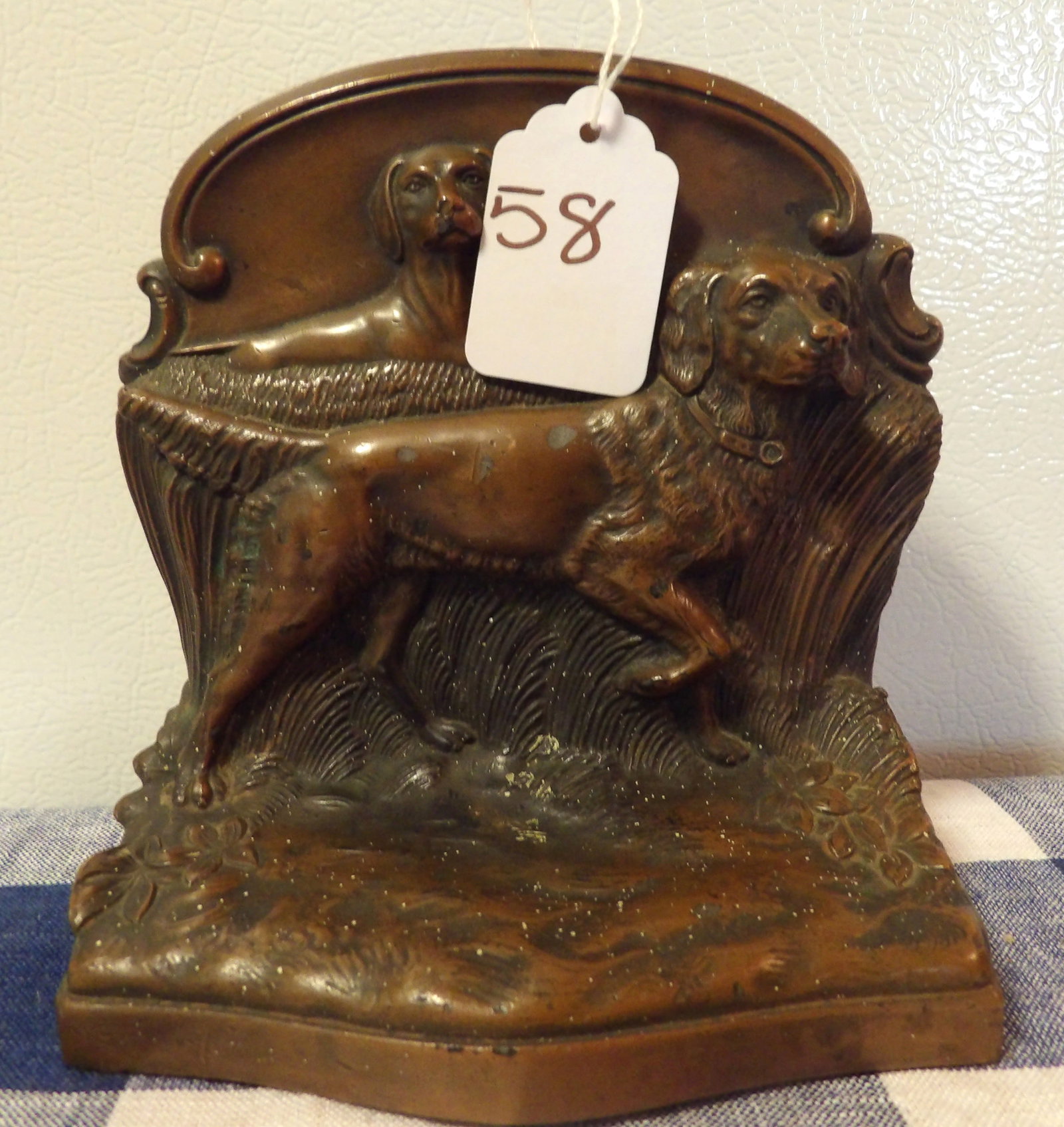 Jennings Brothers Hunting Dogs Bookend: This Jennings Brothers cast iron bookend featutes hunting dogs. Measures 2.5" x 5.25" x 5.5"
