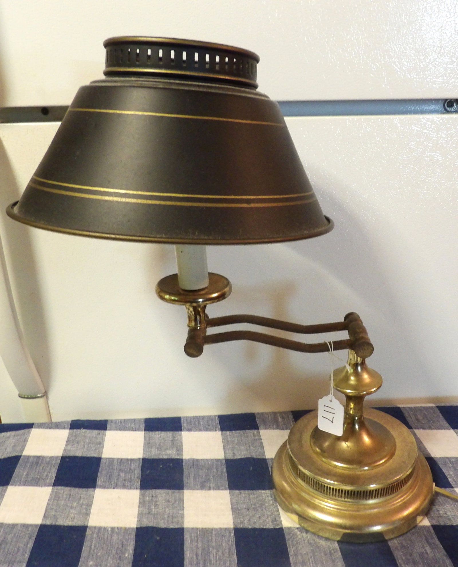 Adjustable Table Lamp w/ Tin Shade: This adjustable table lamp includes a tin shade and measures 20" x 11"