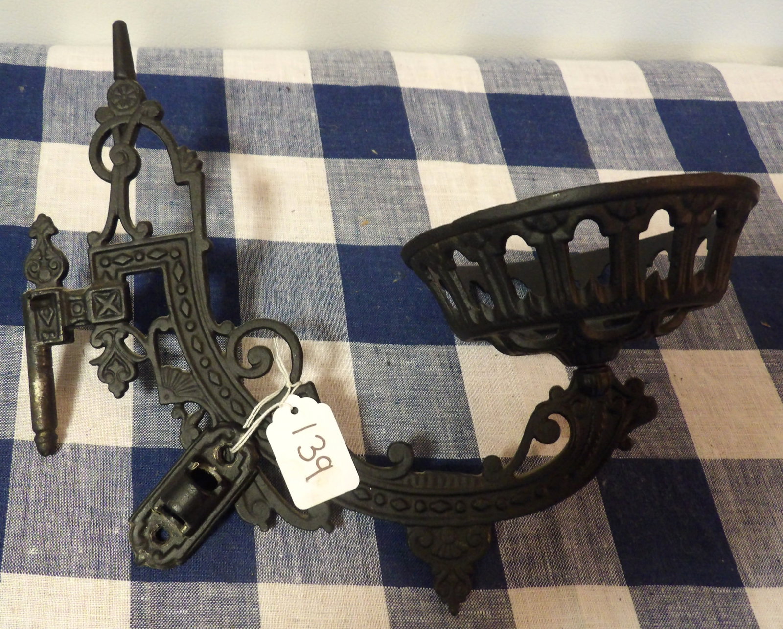 Cast Iron Oil Lamp Wall Bracket: This cast iron oil lamp holder wall bracket measures 9" x 12" x 6"