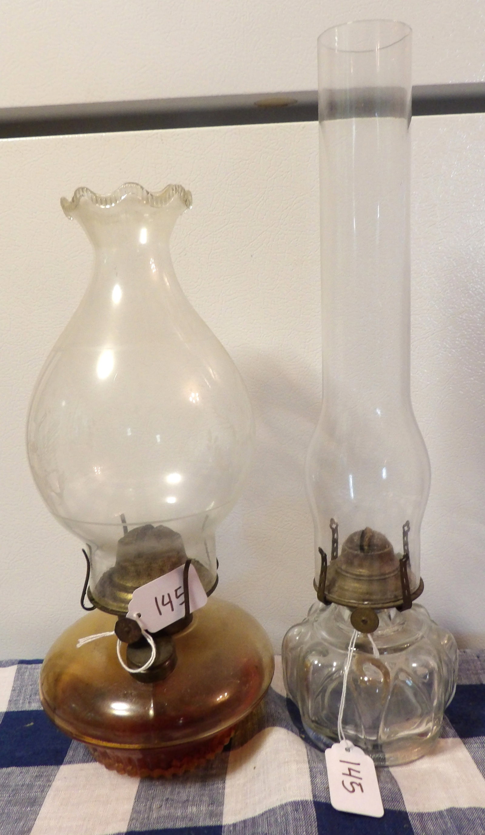 Glass Oil Lamps (2): This pair of glass oil lamps measure 16" and 13" - NO SHIPPING AVAILABLE FOR THIS ITEM - PICK UP ONLY