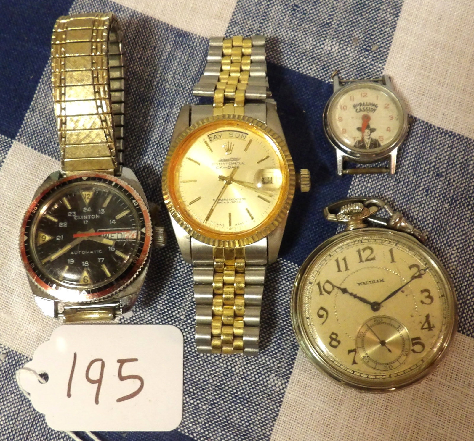 Watch Lot - Clinton Automatic, Oyster Perpetual, Waltham, Hopalong Cassidy: This watch lot includes Clinton Automatic, Oyster Perpetual, Waltham, and a vintaeg Hopalong Cassidy watch.