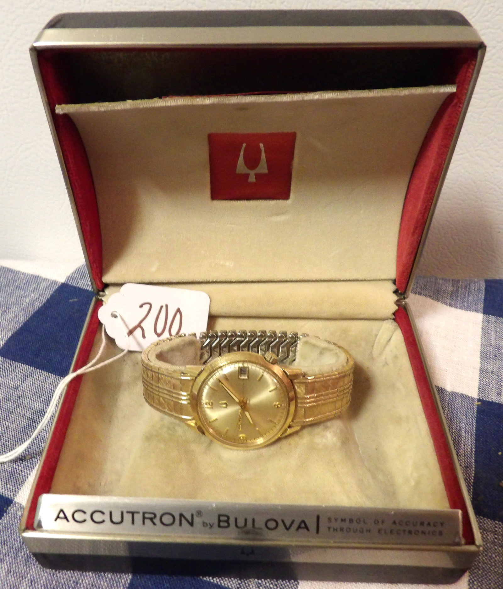 Bulova Accutron Watch: This Bulova Accutron Watch comes in case. Measures 2" x 5" x 4"