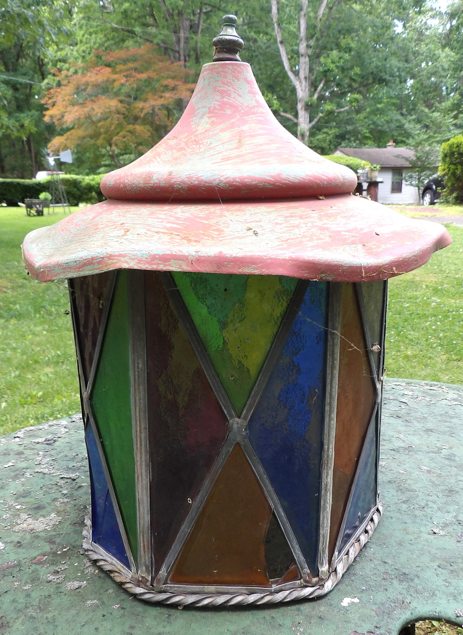 Geometric Stained Glass Lantern Shade: This classic lantern shade features a geometric stained glass pattern. Note: Several small cracks/breaks, but is intact.