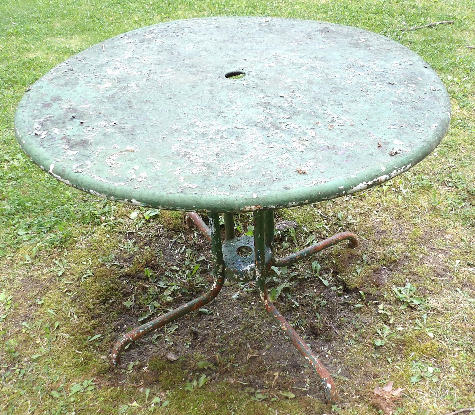 French-Style Outdoor Bistro Table: This lot features a French-style outdoor bistro table. NO SHIPPING AVAILABLE FOR THIS ITEM - PICK UP ONLY