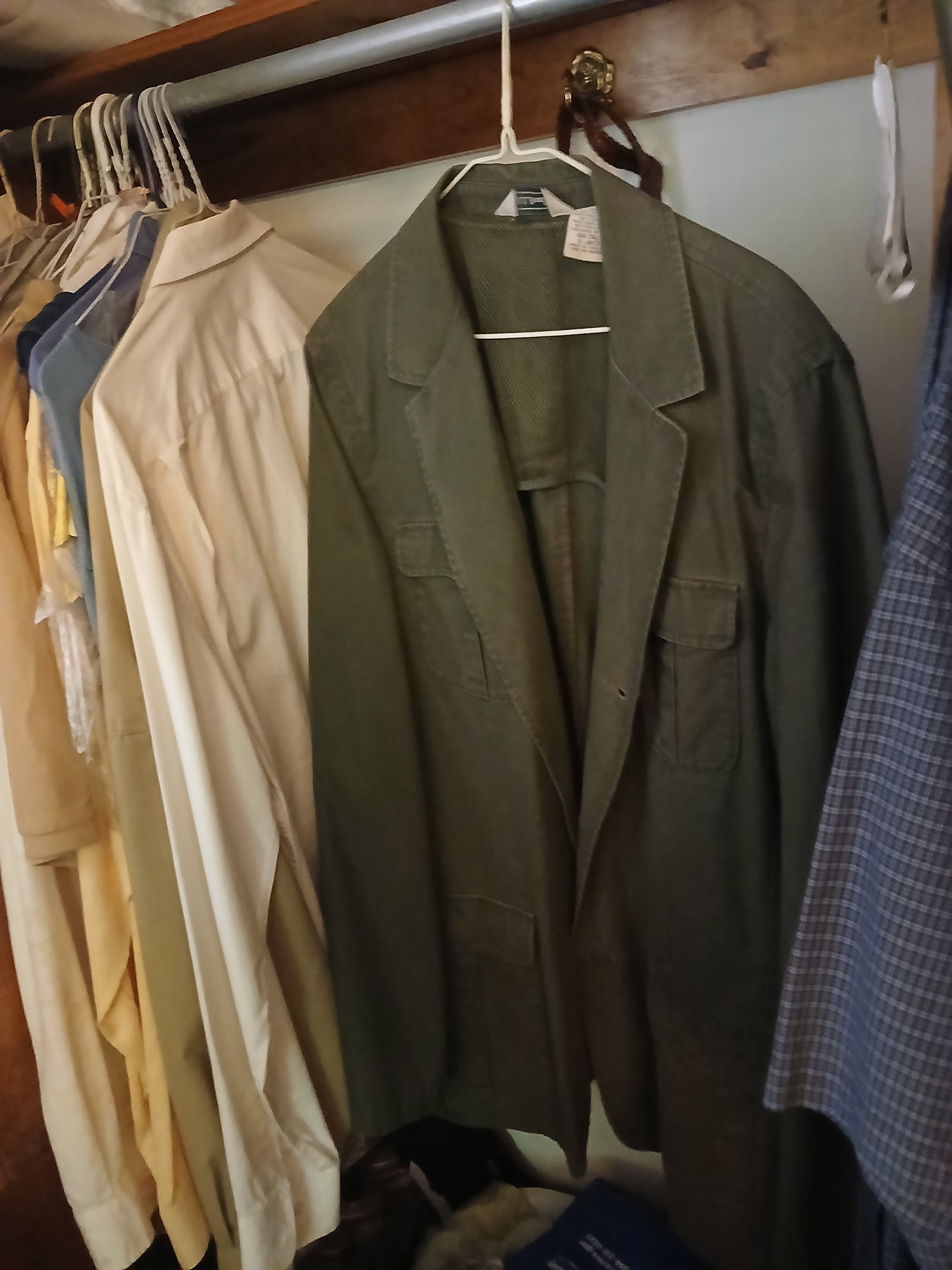 Closet Contents: This lot includes all contents of closet - includes Men's shirts, coats, jackets (Size L - XL), as well as shoes and hats. NO SHIPPING ON THIS ITEM - PICK UP ONLY