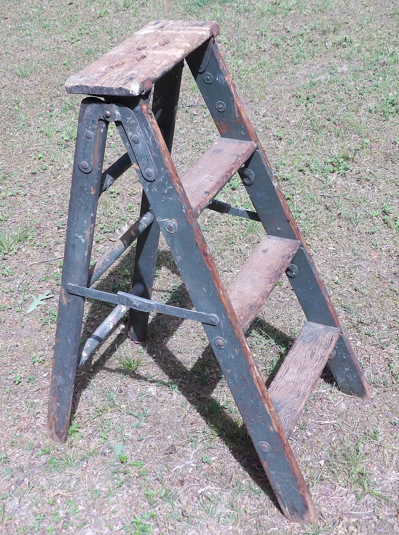 Wooden Step Ladder: This lot features a vintage wooden step ladder. NO SHIPPING ON THIS ITEM - PICK UP ONLY