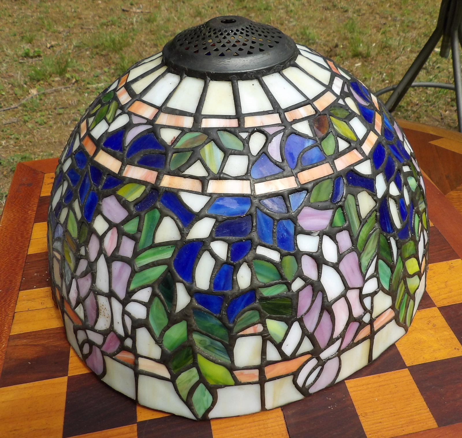 Tiffany-style Glass Lamp Shade: This Tiffany-style Glass Lamp Shade features a lovely floral motif.