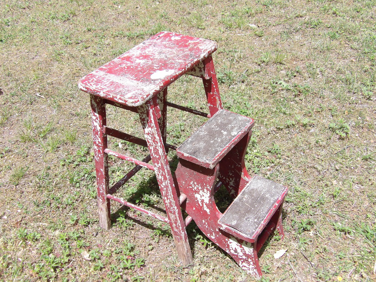 Vintage Wooden Step Stool: This Vintage Wooden Step Stool features folding wooden legs. NO SHIPPING ON THIS ITEM - PICK UP ONLY