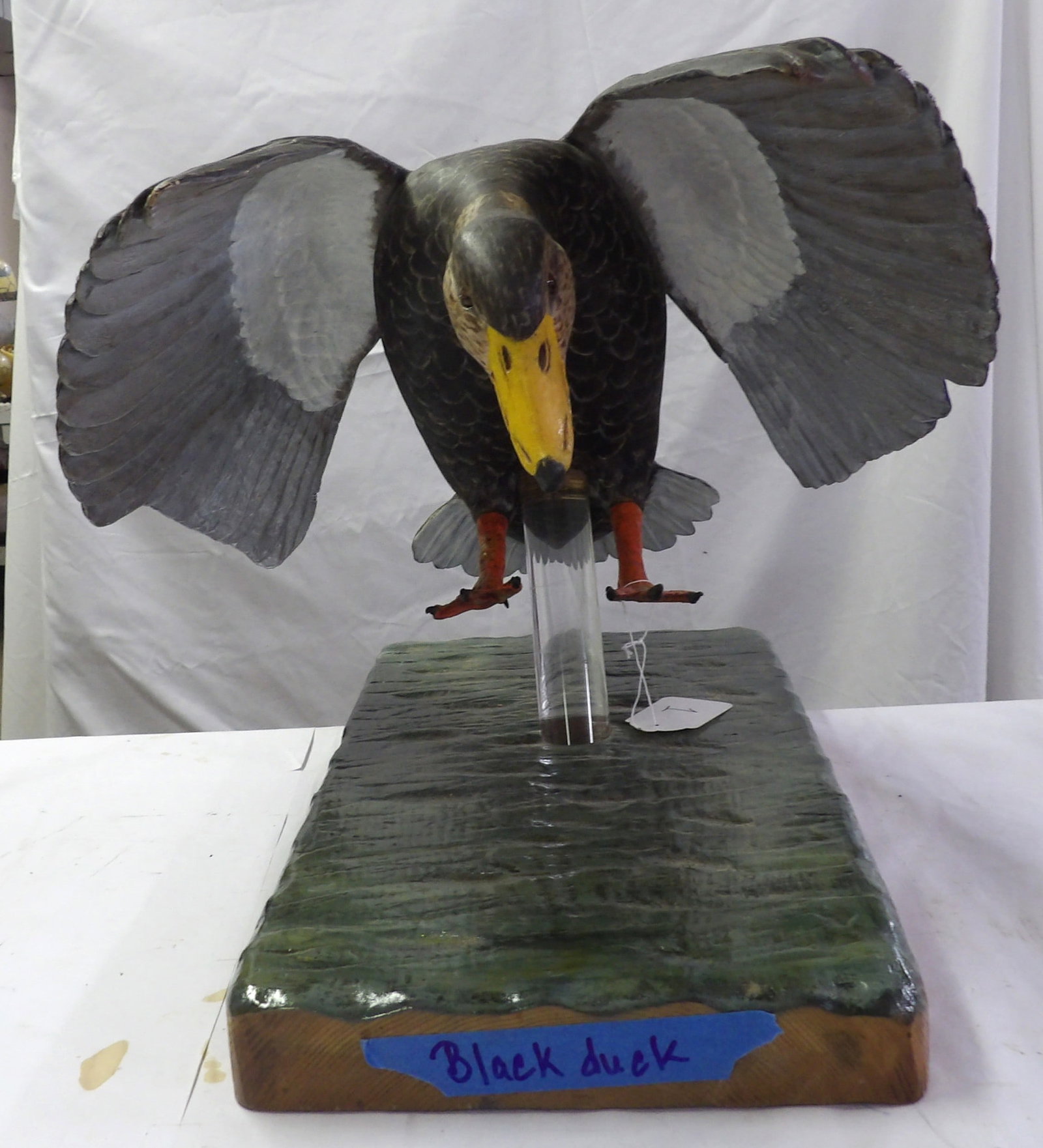 "Black Duck" Metzger Wood Carving: This amazing piece was created by renowned area decoy artist Lawrence Metzger. Mounted on base. Approx 14" x 21" x 10" *NO SHIPPING AVAILABLE FOR THIS ITEM - PICK UP ONLY