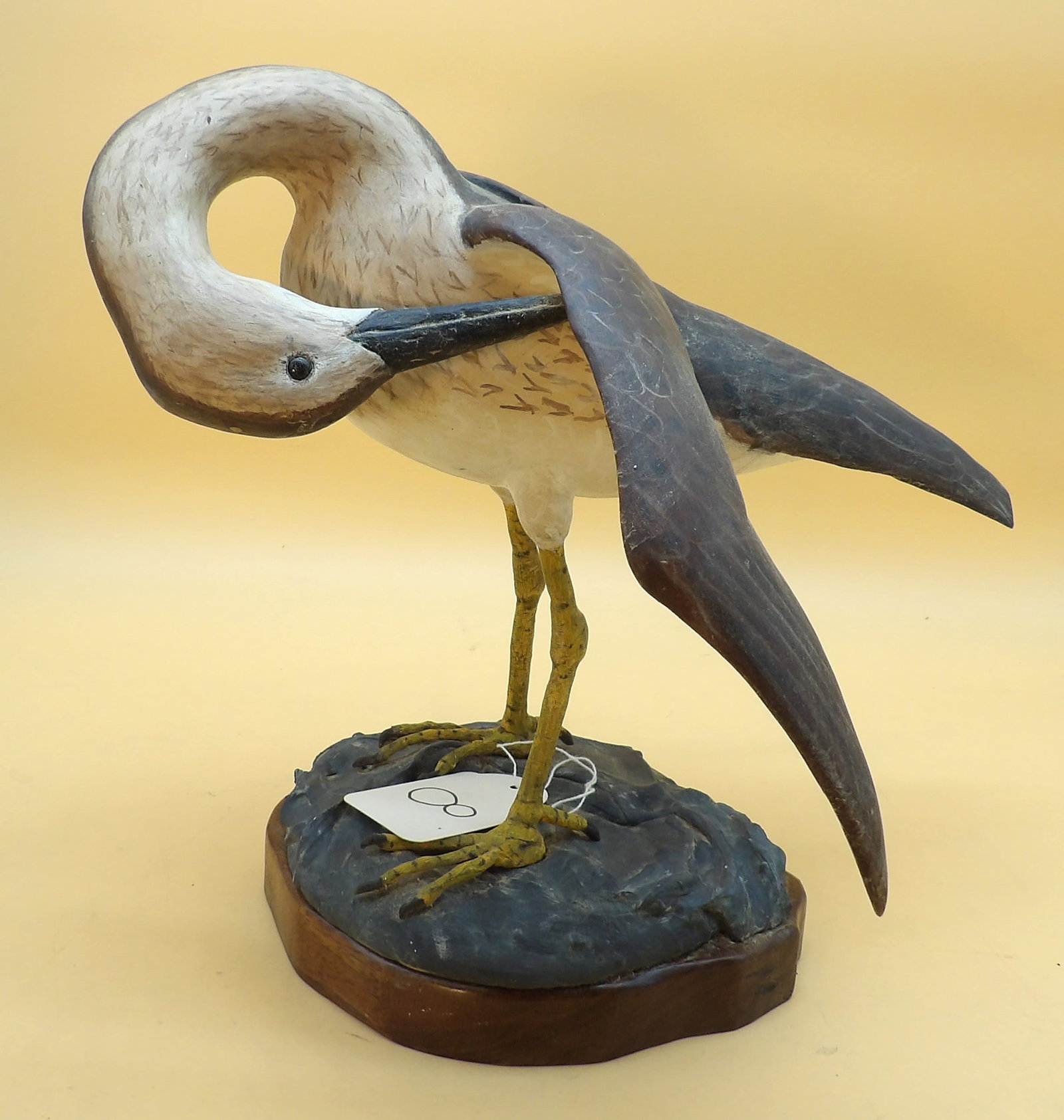 "Yellow Leg" Metzger Wood Duck Carving: This amazing piece was created by renowned area decoy artist Lawrence Metzger. Mounted on base. Approx 11" x 12" x 9". NO SHIPPING AVAILABLE FOR THIS ITEM. PICK UP ONLY