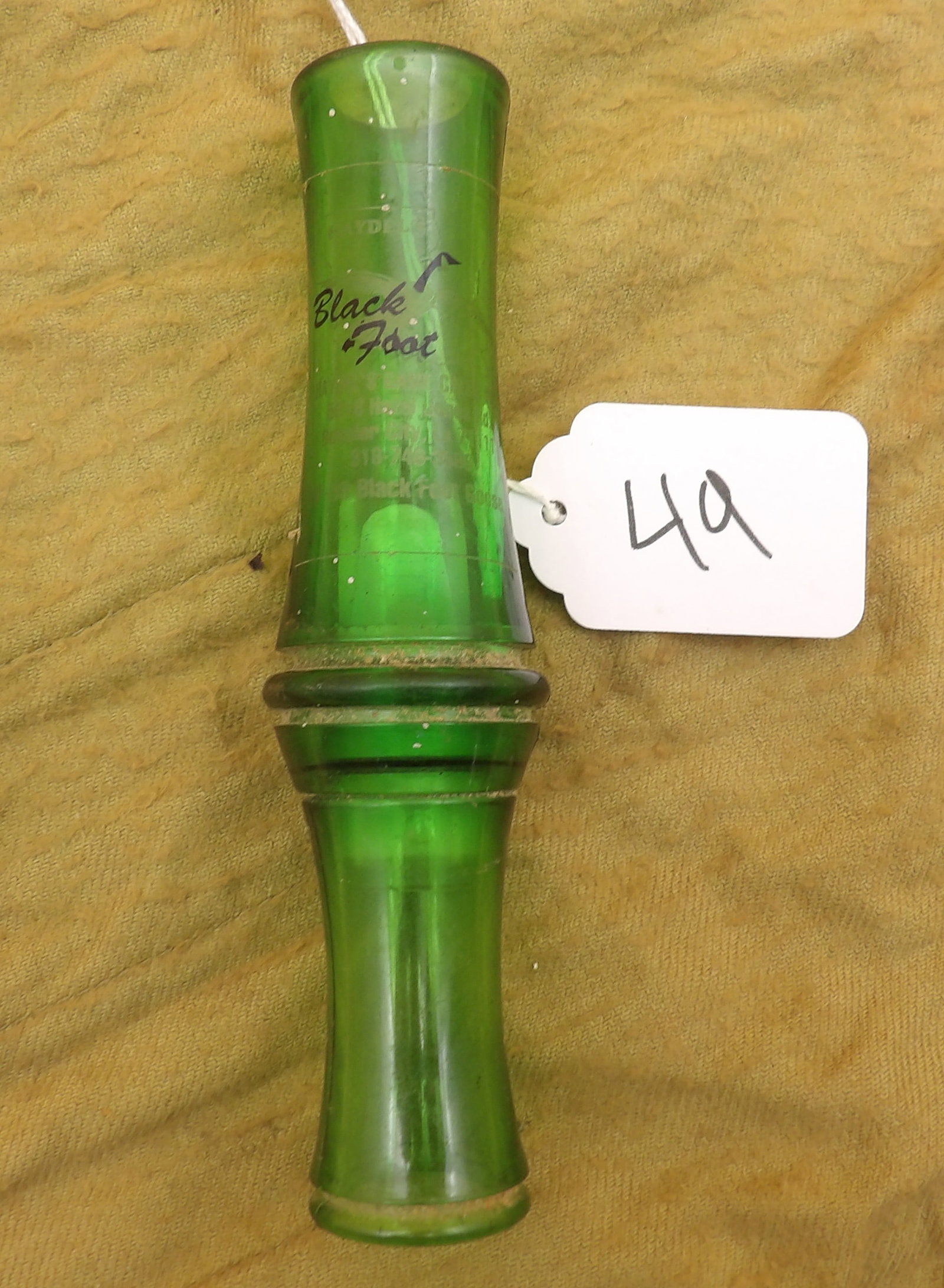 Haydel's Black Foot Game Call: This Haydel's Black Foot Game Call is made with clear green plastic. Approx 5"