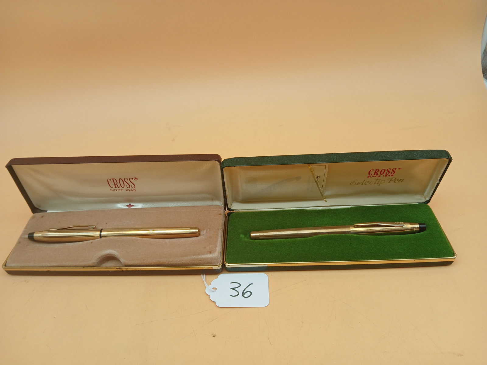 Cross Brand Selectip Pens (2): This pair of Cross Brand pens are both 1/20 10k Gold Filled Selectip and come in their cases. Measure approx 1" x 6.5" x 2.5"