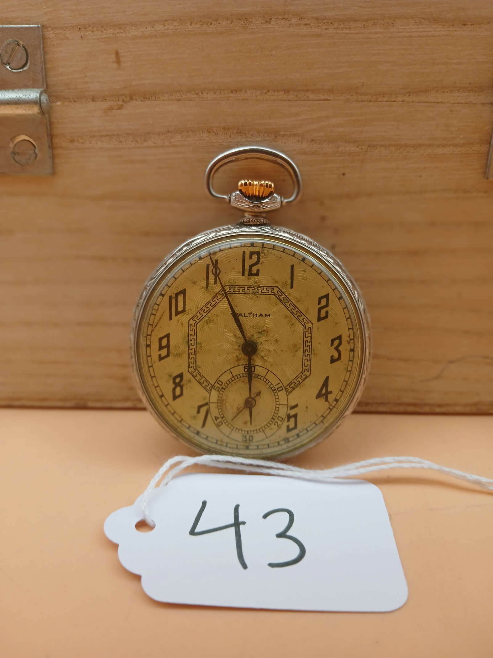Waltham Pocket Watch: This vintage Waltham pocket watch is in working order and measures approx 2.5" x 2".