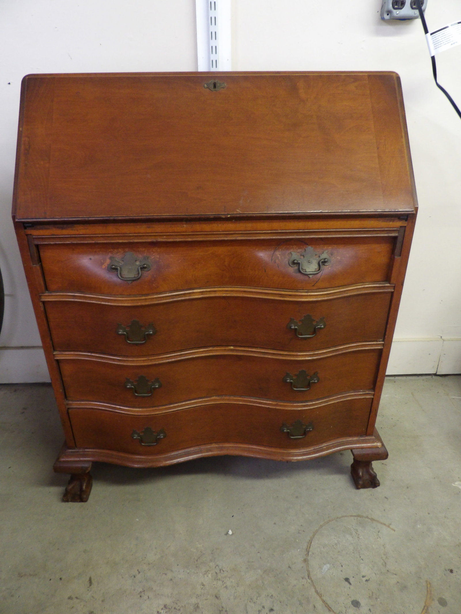 JB Van Sciver Secretary Desk: This mahogony drop front secretary desk (JB Van Sciver) features inside cabinets and compartments. Measures approx 40" x 31" x 17". NO SHIPPING AVAILABLE FOR THIS ITEM - PICK UP ONLY