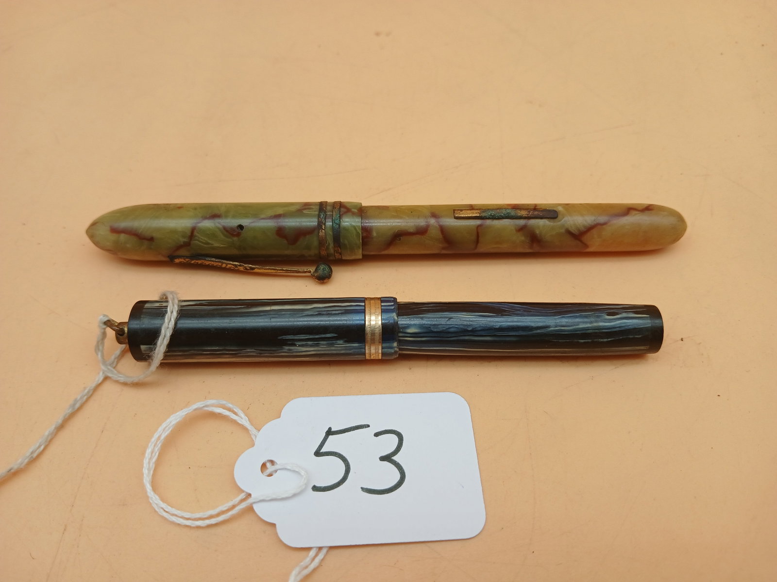 Waterman & Arcadia Fountain Pens (2): This lot features two very stylish vintage fountain pens - one by Arcadia (14k Gold Plate) and one by Waterman.Measures approx 4" and 5".