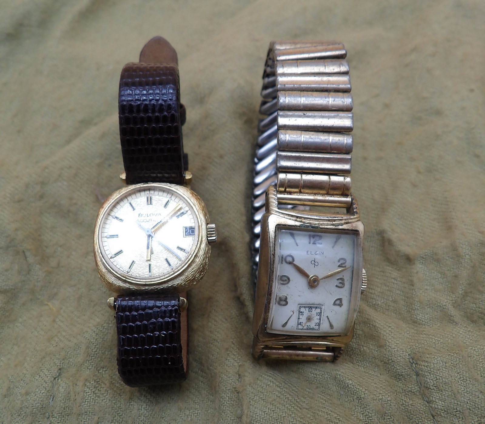Elgin & Bulova Accutron Watches: This pair of vintage watches includes an Elgin and a Bulova Accutron. Both are intact, but need service to be restored to working order.