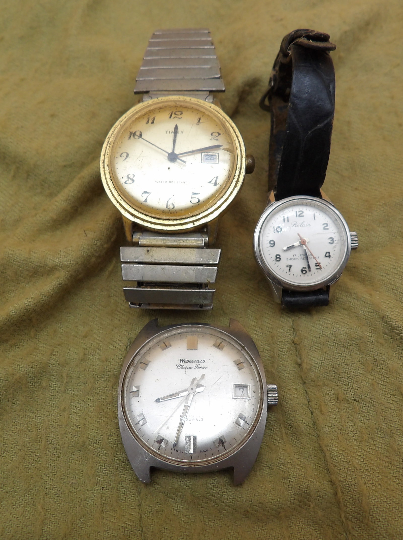Belair, Timex, Wedgefield Watches: This trio of vintage wristwatches includes Belair, Timex, and Wedgefield. These watches are in working order.