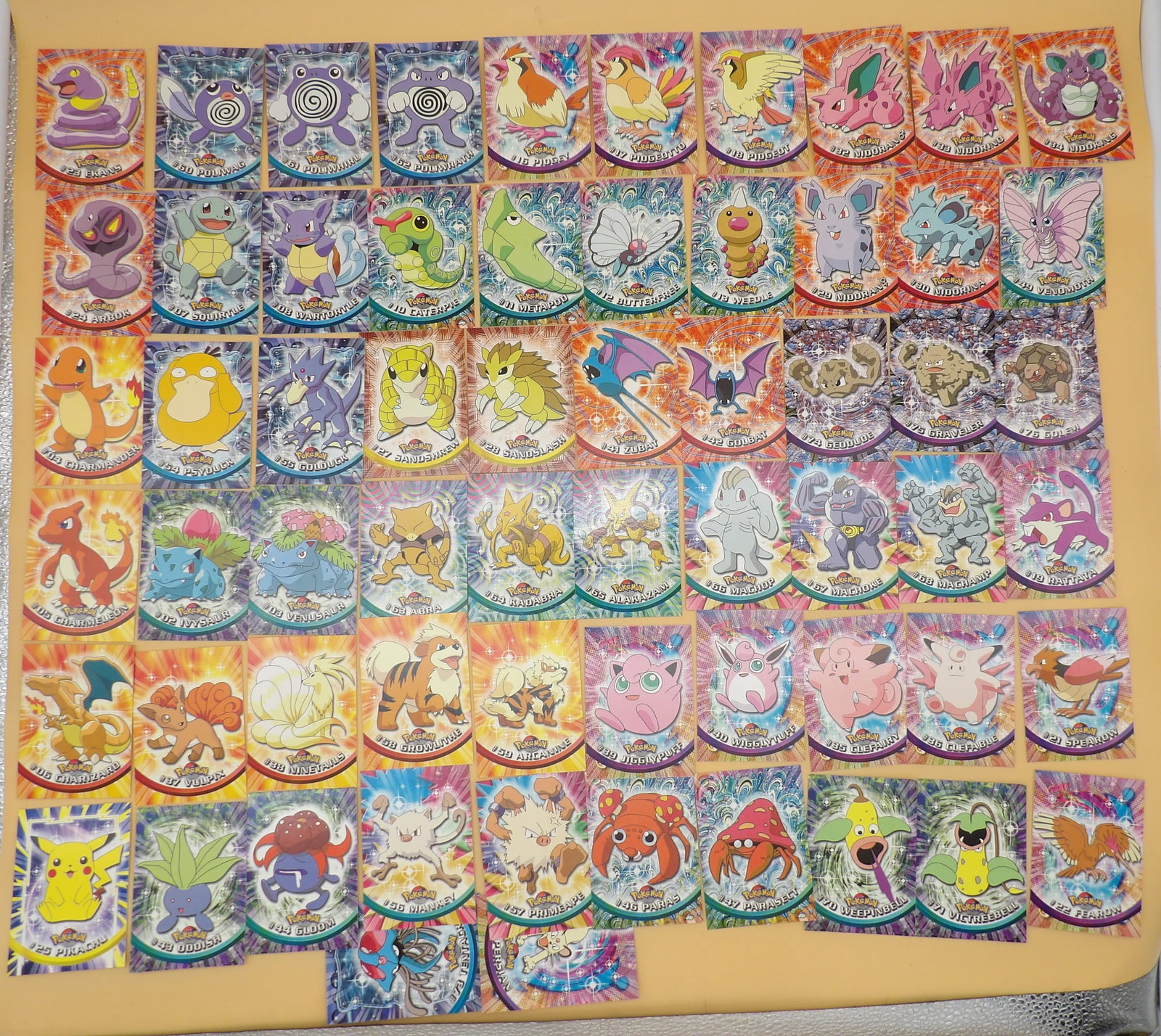 Pokemon Topps Trading Cards (62): This collection of 62 Topps (1999 2nd Edition Black Logo) Trading Cards includes the popular Charizard non-foil and many others! Cards are not graded, but are in great condition w/ no significant