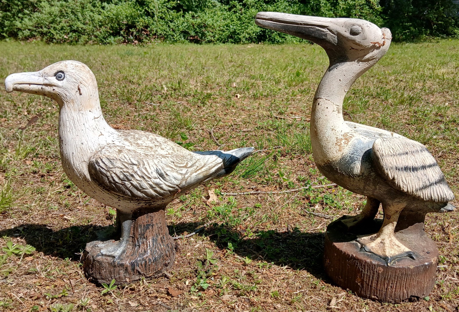 Concrete Pelican & Seagull Statues: This pair of concrete yard statues features a pelican ( 15" x 13" x 6") and a seagull (12" x 15" x 5"). NO SHIPPING AVAILABLE FOR THIS ITEM - PICK UP ONLY