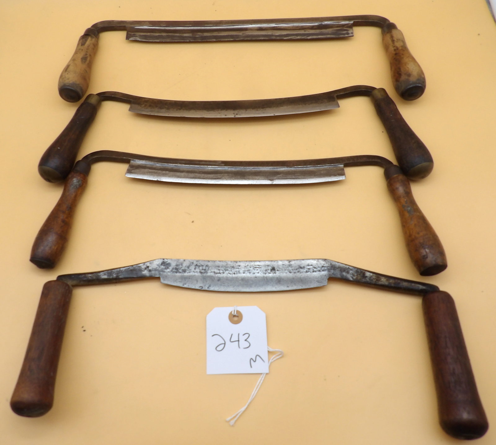 Vintage Draw Knife Lot (4 pcs): This collection of 4 vintage draw knives is from the Metzger collection, and was likely used in the creation of his renowned decoys. Measures approx: 15" - 17" each.