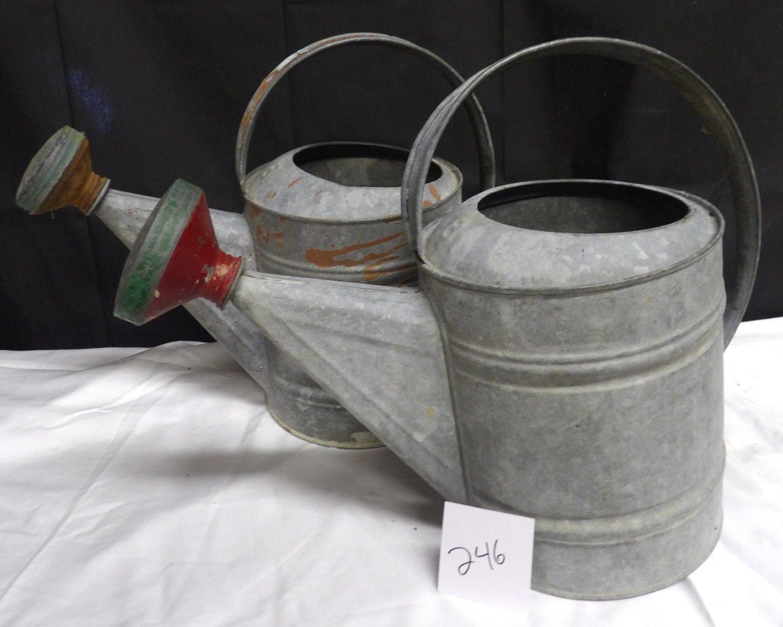 Galvanized Steel Watering Cans (2): This pair of vintage galvanized steel watering cans include detachable rose sprinkler heads. Unbranded. Measures approx: 14" x 16" x 8" each. NO SHIPPING AVAILABLE FOR THIS ITEM - PICK UP ONLY