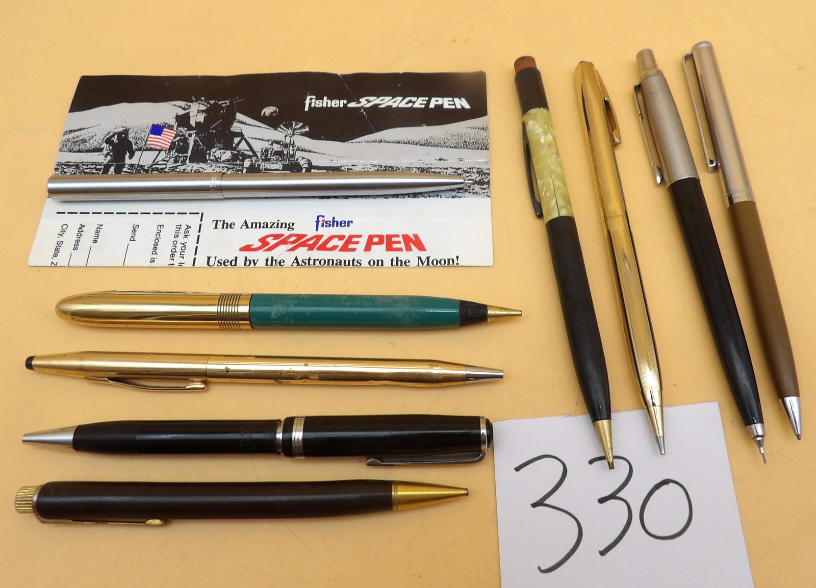 Mechanical Pencil Lot (9 pcs): This 9 piece mechanical pencil collection includes Fisher Space Pen, Sheaffer, Cross, Wearever, Eversharp, Parker, Esterbrook, and Papermate.