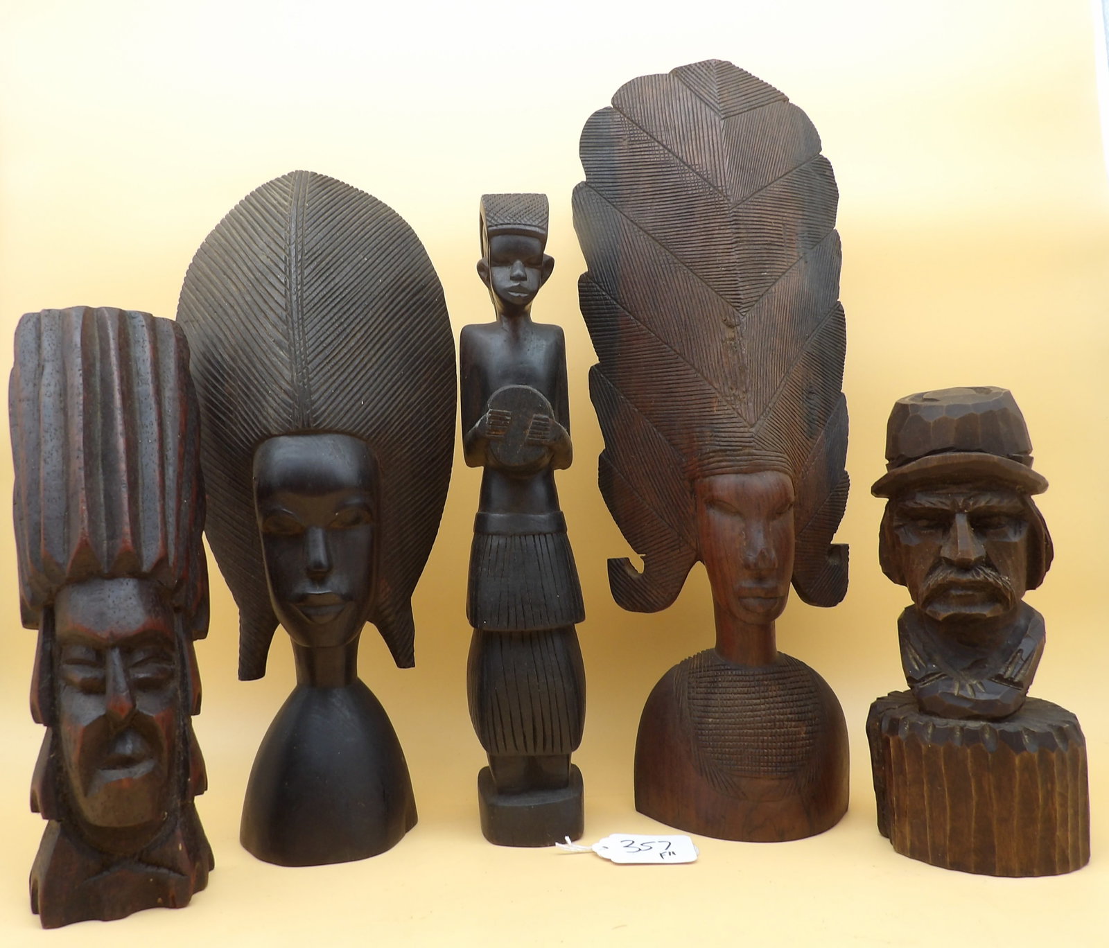 Wood Carved Statues / Busts (5 pcs): This group of 5 carved wood pieces includes African, Native American, and Civil War inspired pieces. Measures approx