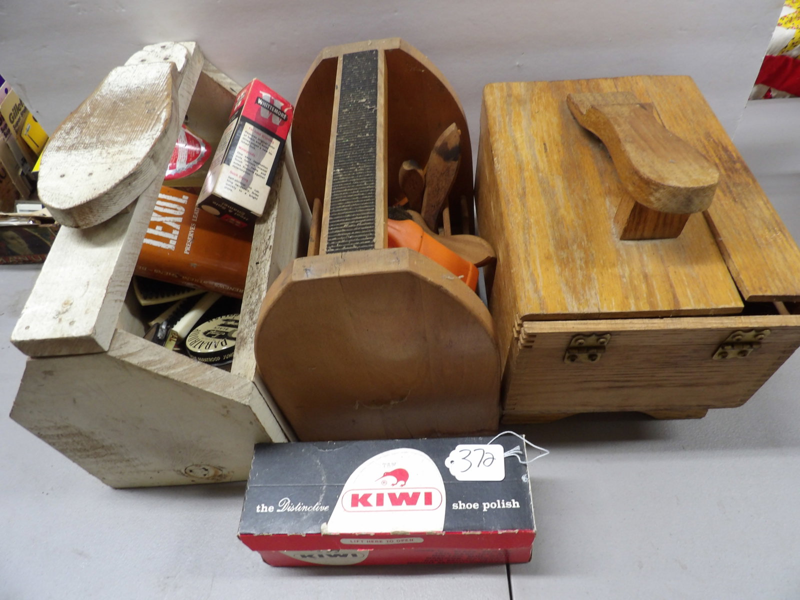 Shoe Shine Lot: This vintage shoeshine lot includes 3 shine kit/carriers, brushes, and various polishes and accessories. NO SHIPPING ON THIS ITEM - PICK UP ONLY