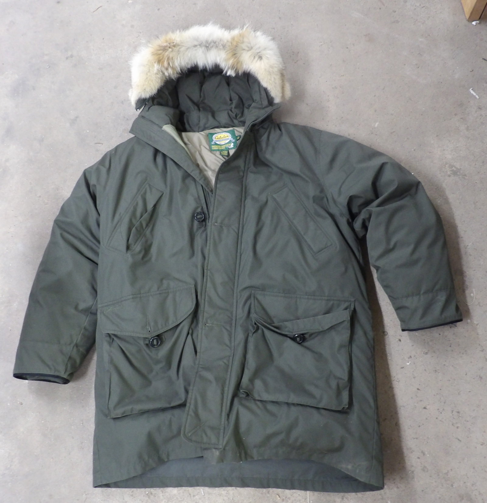 Cabela's Northern Goose Down Outdoor Jacket: This amazing Cabela's Northern Goose Down Outdoor Jacket is men's size XL and in great condition. Features a furred hood in addition to thick goose down stuffing.