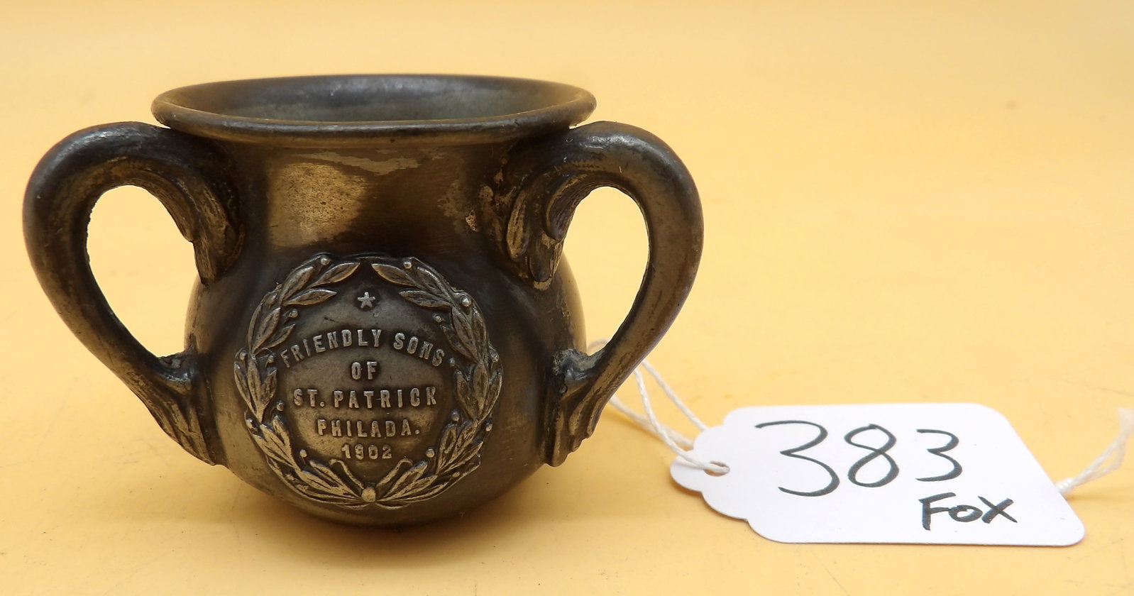 Edwin V. Snyder Silver Plated Trophy Cup: This silver plated triple-handled trophy cup was made by known silversmith Edwin V Snyder with Art Silver of Philadelphia. It is inscribed "Friendly Sons of St. Patrick Philadelphia 1902". Measures