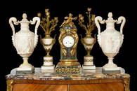 A LARGE PAIR OF 19TH CENTURY ITALIAN ALABASTER URNS AND COVERS IN THE STYLE OF PIRANESI
