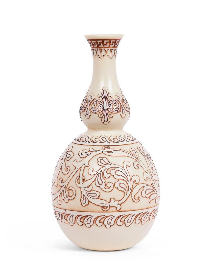 THOMAS WEBB & SONS: A RARE AND LARGE 'IVORY CAMEO' GLASS VASE CIRCA 1885: THOMAS WEBB & SONS: A RARE AND LARGE 'IVORY CAMEO' GLASS VASE CIRCA 1885of double gourd bottle shape, the pale caramel-coloured glass etched in shallow relief and heightened with brown enamel, the