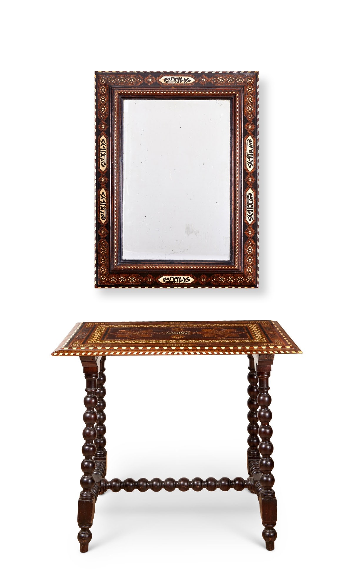AN EARLY 20TH CENTURY HISPANO MORESQUE BONE INLAID TABLE AND MIRROR: AN EARLY 20TH CENTURY HISPANO MORESQUE BONE INLAID TABLE AND MIRROR the mirror with rectangular frame inlaid Islamic khatam marquetry and parquetry and bone geometric forms, with bone panels inlaid wi