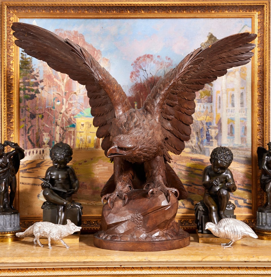 A MASSIVE EARLY 20TH CENTURY BLACK FOREST CARVED WOOD MODEL OF AN EAGLE (1 of 11)