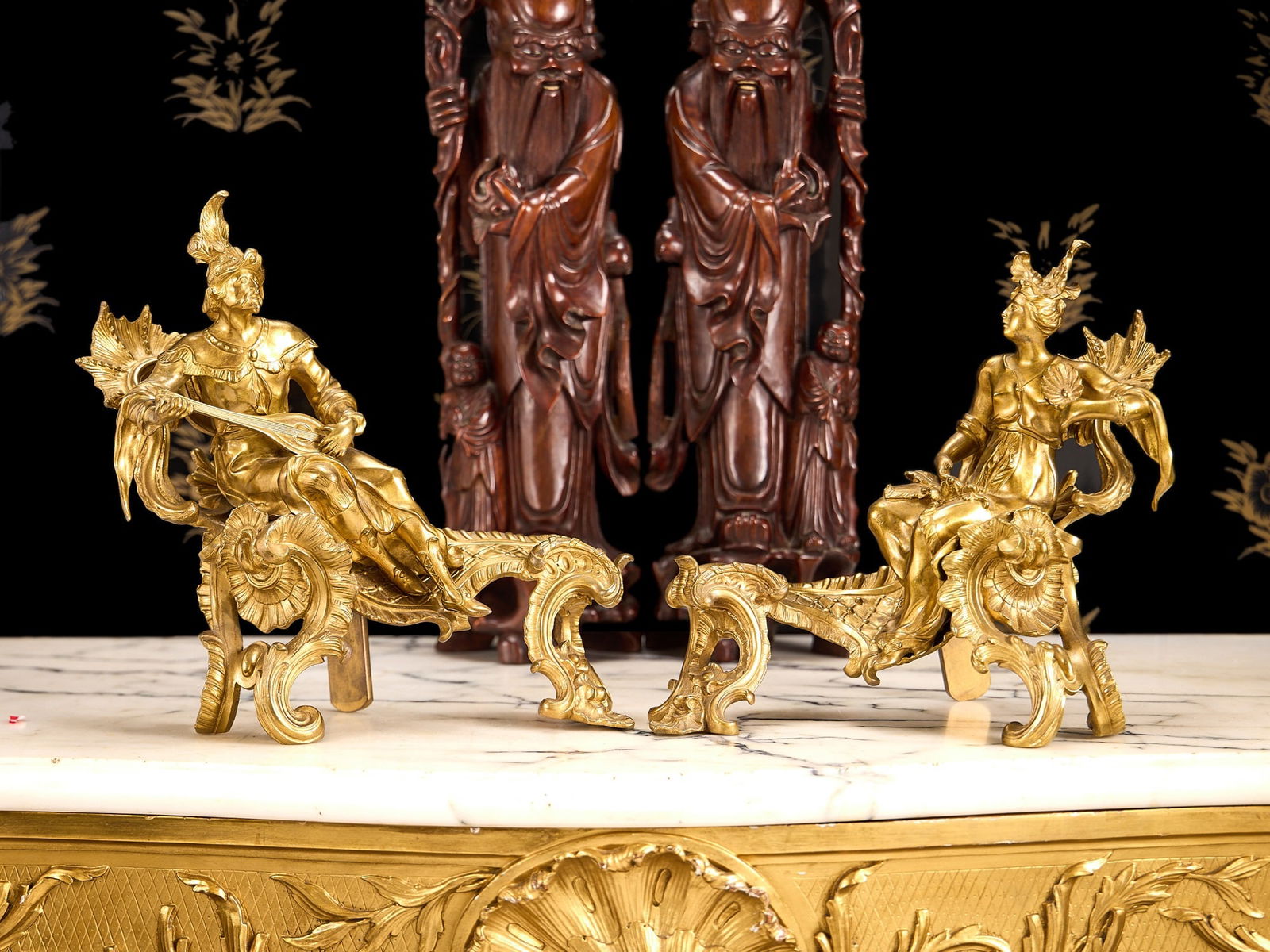 A PAIR OF 19TH CENTURY FRENCH ORMOLU CHENETS IN THE LOUIS XV STYLE (1 of 1)