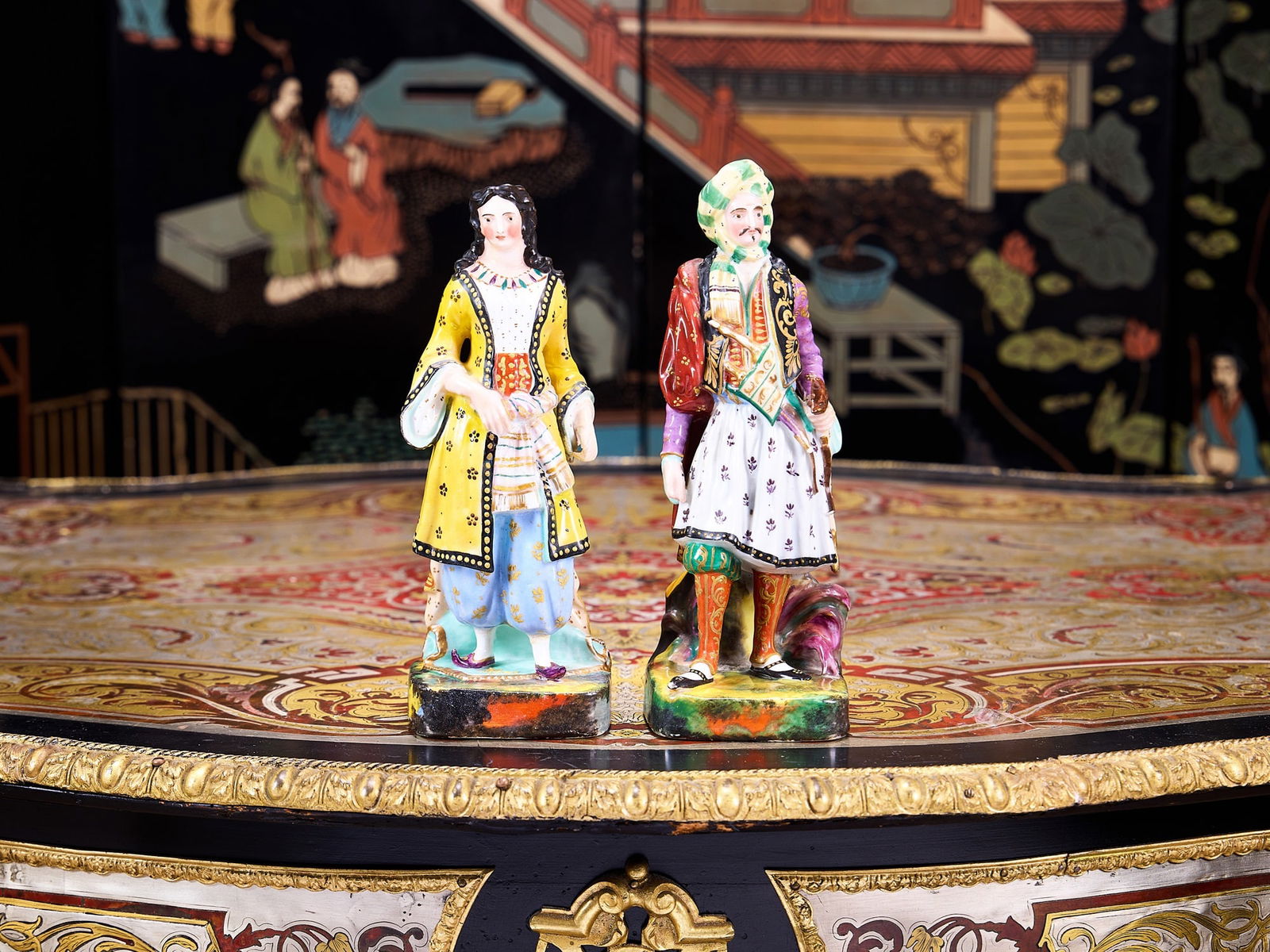 A PAIR OF 19TH CENTURY PORCELAIN DE PARIS OTTOMAN FIGURAL FLASKS: A PAIR OF 19TH CENTURY PORCELAIN DE PARIS OTTOMAN FIGURAL FLASKS French, for the Turkish market, depicting a Sultan and Sultana, with holes to the top of the heads, raised on shaped square bases, mark