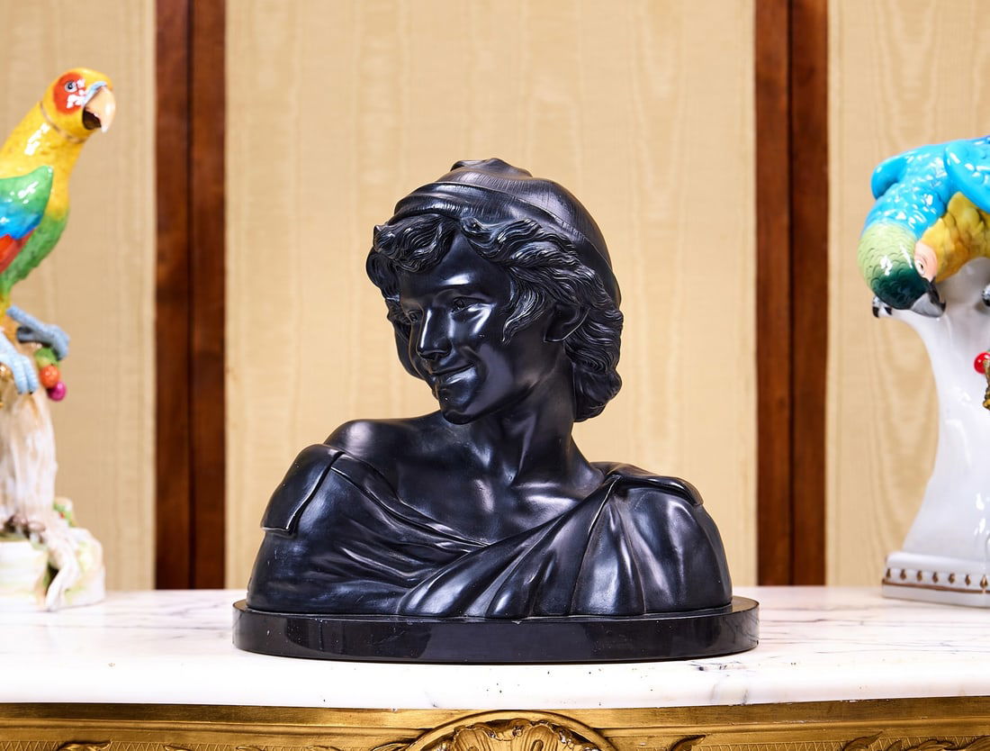 AFTER FRANCOIS RUDE (FRENCH, 1784-1855): A TERRACOTTA BUST OF A FISHERBOY: AFTER FRANCOIS RUDE (FRENCH, 1784-1855): A TERRACOTTA BUST OF A FISHERBOY the Neapolitan fisher boy wearing a typical cap, facing dexter and laughing, black patinated, marked 'TERRE CUITE VERITABLE',