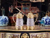 MAISON ODIOT: A FINE PAIR OF 19TH CENTURY SILVER GILT AND GLASS CLARET JUGS CIRCA 1870