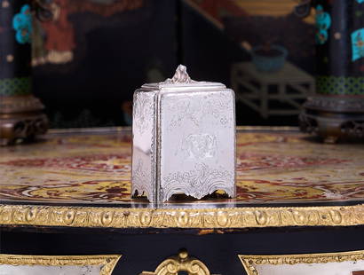 PAUL DE LAMERIE: A RARE MID 18TH CENTURY SILVER TEA CADDY, C. 1745: PAUL DE LAMERIE: A RARE MID 18TH CENTURY SILVER TEA CADDY, C. 1745 the George II period English sterling silver tea caddy in the Rococo style, of rectangular form with rounded shoulders, the hinged co