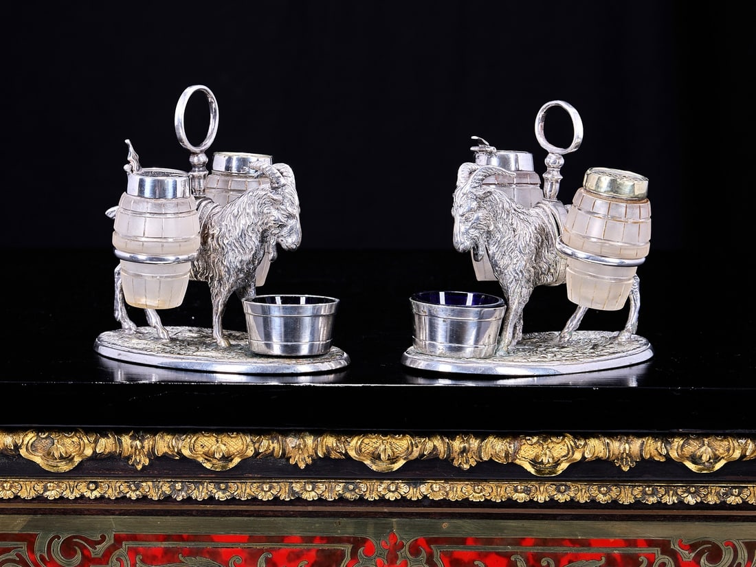 A PAIR OF VICTORIAN CRUET SETS MODELLED WITH GOATS (1 of 1)