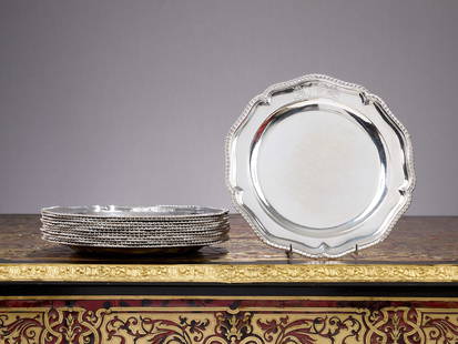 A SET OF TWELVE GEORGE III STERLING SILVER DINNER PLATES FROM THE DUTTON SERVICE C. 1768: A SET OF TWELVE GEORGE III STERLING SILVER DINNER PLATES FROM THE DUTTON SERVICE C. 1768 Mark of Augustin le Sage, London each of the 18th century Georgian English plates of circular form, with gadroo