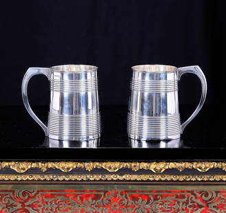 A PAIR OF GEORGE III STERLING SILVER MUGS, LONDON, C. 1795, MARKED FOR PETER & ANN BATEMAN: A PAIR OF GEORGE III STERLING SILVER MUGS, LONDON, C. 1795, MARKED FOR PETER & ANN BATEMAN the Georgian, English 18th century solid silver cups or mugs with ringed bodies and scroll handles, hallm