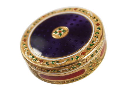 A FINE 18TH CENTURY GOLD AND ENAMEL BONBONNIERE, DANIEL MARCHAND & CO. C. 1785: A FINE 18TH CENTURY GOLD AND ENAMEL BONBONNIERE, DANIEL MARCHAND &amp; CO. C. 1785 German, Hanau, the circular powder or snuff box of gold with purple enamel decoration to the cover and underside, wit