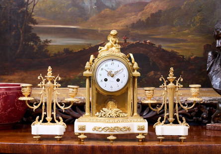 A FINE 19TH CENTURY FRENCH GILT BRONZE AND MARBLE CLOCK GARNITURE: A FINE 19TH CENTURY FRENCH GILT BRONZE AND MARBLE CLOCK GARNITURE in the Louis XVI style, the mantel clock surmounted by a figure of Cupid with an arrow, over four fluted columns and a shaped plinth b